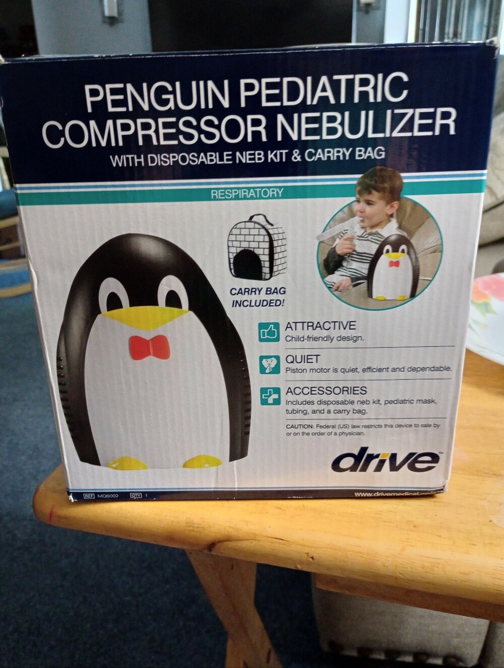 New.     Bass. Drive Penguin Pediatric Compressor Nebulizer – Black/White
